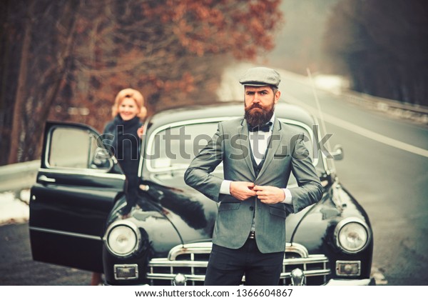 security guard of luxury woman. securoti guard man\
and girl in retro car