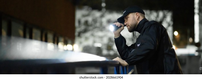 Security Guard Man At Night. Building Alley Patrol