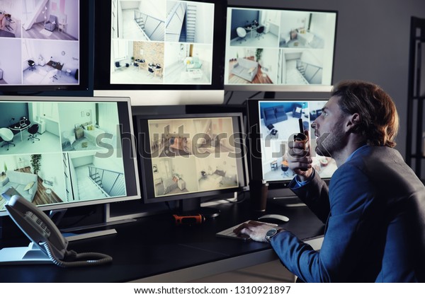 Security Guard Monitoring Modern Cctv Cameras Stock Photo