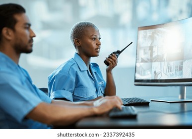 Security guard, safety and control room with a radio and computer monitor for surveillance. Man and woman working together for crime investigation, cctv screen and communication with a walkie talkie - Powered by Shutterstock