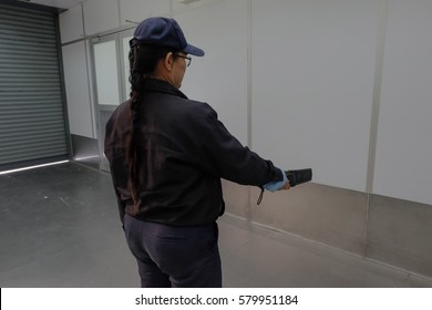 security guard with scanner