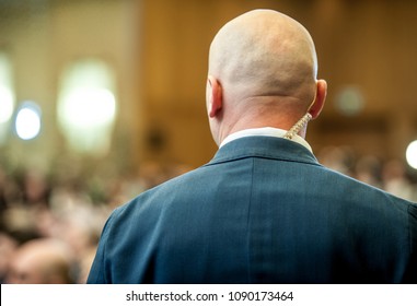 Security Guard. Secret Event. Private Guard Standing And Watching In Crowd.  Protection Service