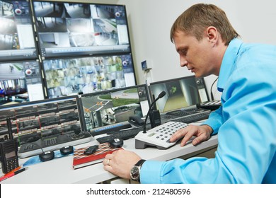 Security Guard Watching Video Monitoring Surveillance Security System