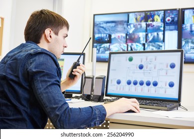 Security Guard Watching Video Monitoring Surveillance Security System