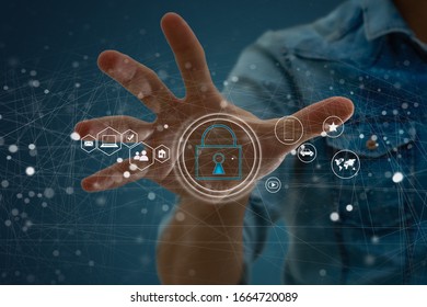 Security and Insurance Data Industry 4 Concept. Worker touched shield lock icon on virtual screen. Industrial safety, smart manufacture protection information technology integration. - Powered by Shutterstock