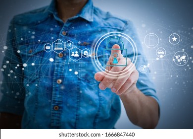 Security and Insurance Data Industry 4 Concept. Worker touched shield lock icon on virtual screen. Industrial safety, smart manufacture protection information technology integration.