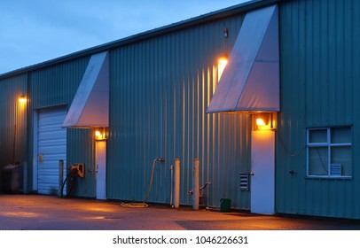 Security lights are used to illuminate a warehouse, providing additional security for a commercially owned building. 