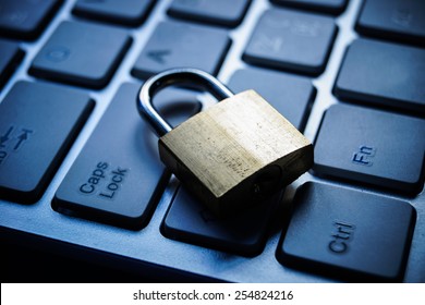 Security Lock On Black Computer Keyboard - Computer Security Concept