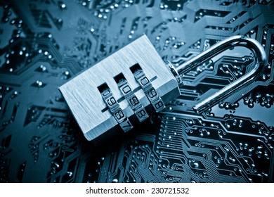 security lock on computer circuit board - computer security concept