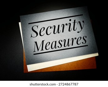 Security measures concept with padlock, shield, CCTV, and protective icons on desk, symbolizing safety, surveillance, protection, and risk management. 