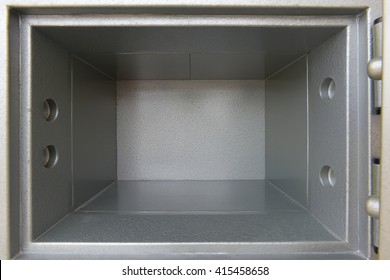 Security metal safe with empty space inside open isolated on white background. This has clipping path.