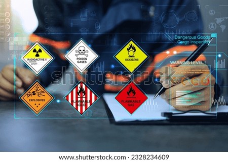 Security officers writing on clipboards and inspect the storage of dangerous goods in the warehouse for operator safety such as explosions, radioactive, toxic gases, etc.