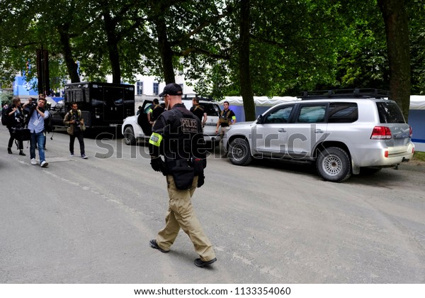 Security personnel patrols during a working dinner
of NATO members at the Parc du Cinquantenaire in Brussels, Belgium
on Jul. 11, 2018