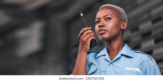 Security, radio and a black woman police officer in the city during her patrol for safety or law enforcement. Walkie talkie, communication and service with a female guard on a street in an urban town