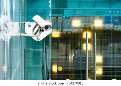 Security Surveillance System At The Entrance To A Modern Office Building. Two Cameras Of Video Surveillance