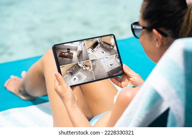 Security System CCTV Camera And Surveillance On Tablet Screen On Vacation