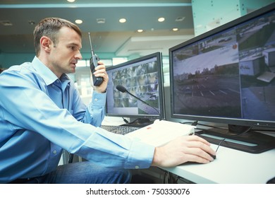 Security Worker During Monitoring. Video Surveillance System.