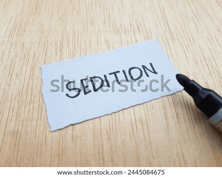 Sedition writting on table background.