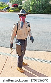 Sedona, Arizona/USA - April 18 2020: A Pest Control Technician Has Created A Unique Protective Mask For Himself When Spraying.