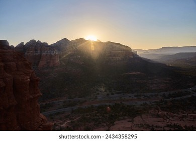 Sedona Sunrise Over Red Rock Cliffs and Winding Road - Powered by Shutterstock