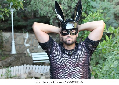 Seductive Man With Bunny Mask And See Through Mesh Shirt