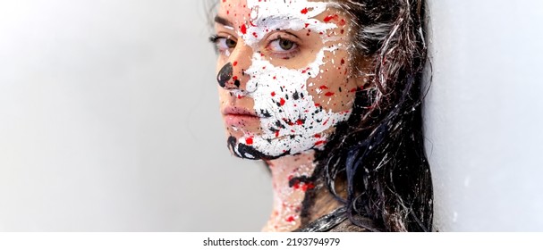 Seductive Portrait Of A Sexy Young Proud And Stern, Strict Looking Brunette Woman, Dots Of White, Black And Red Color Paint, Decorative, Creative Expressive Abstract Painting Art, Make Up, Copy Space