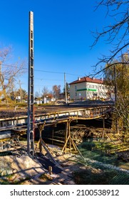 Sedziszow Malopolski, Poland - November 1, 2021: Reconstruction works of the 3 Maja street bridge over Budzisz creek in Sedziszow town of Podkarpacie region