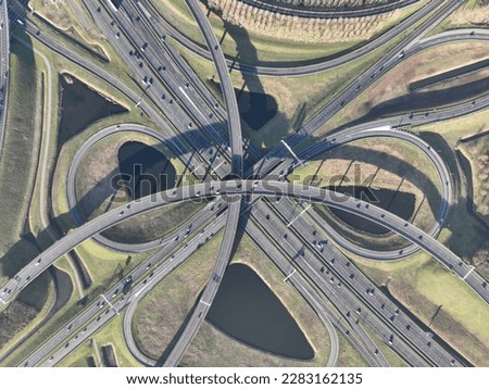 See the intricate web of roads and bridges from above with an aerial drone video of Ridderkerk's highway interchange.