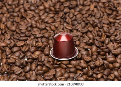 Seed of coffee with capsule on white background - Shutterstock ID 213898933