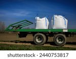 Seed on trailer ready to plant in fields in farm country
