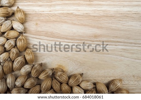 Seeds on wood background