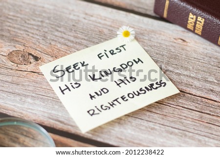 Seek first the Kingdom of God and His righteousness. Believe, trust in Jesus Christ. Pray, obey have faith in God. Inspiring handwritten Bible verse. Biblical concept devoted Christian.