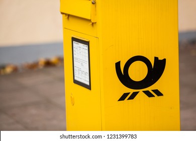 Seelbach, Baden-Wuerttemberg, BW / Germany - October 31, 2018: 
Yellow Mailbox Of Deutsche Post AG, The World's Largest Postal Service. It Stands Near The City Hall Of Town.