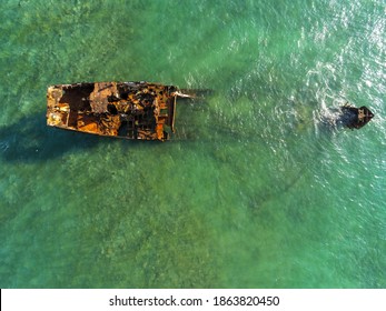 Seen from above a wrecked boat in são tome and principe - Shutterstock ID 1863820450