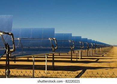 SEGS Solar Thermal Energy Electricity Plant With Parabolic Mirrors Concentrating The Sunlight