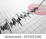 Seismograph and earthquake.A seismograph records the seismic activity of an earthquake