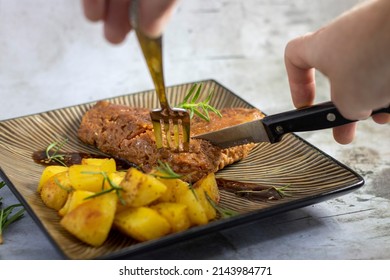 Seitan Steak And Baked Potatoes Plated