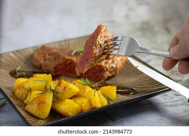 Seitan Steak And Baked Potatoes Plated