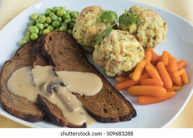 Seitan Steak With Mushroom Gravy, Bread Dumplings, Fresh Peas And Baby Carrots