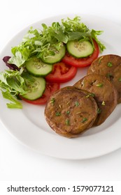 Seitan With Vegetables Isolated On White Background. Fake Meat.