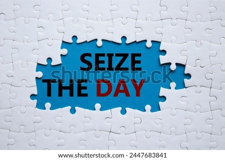 Seize the day symbol. White puzzle with words Seize the day. Beautiful blue background. Business and Seize the day concept. Copy space.