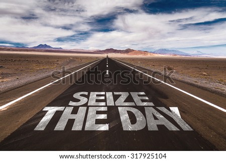 Seize the Day written on desert road