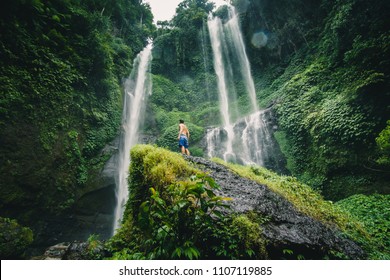 Sekumpul waterfall in Bali surrounded by tropical forest