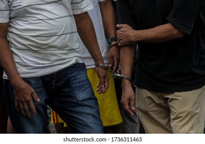 Selangor, Malaysia- 20 May 2020- 
 Close-up Of Cuffed And Chained Of Undocumented Immigrants During An Operation To Weed Out Illegal Visitors 

