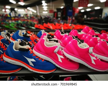 SELANGOR, MALAYSIA - AUGUST 20, 2017: Footwear of various brands in the Sport Planet store in Plaza Alam Sentral Mall during Merdeka Sales. The mall is located at Shah Alam, Selangor.