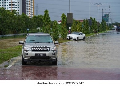 Selangor, Malaysia - December 18, 2021 - Waterlogged Road Causing Couple Of Vehicle Trapped In A Flash Flood.