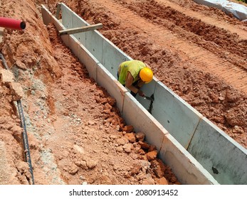 SELANGOR, MALAYSIA -JANUARY 22, 2021: Underground precast concrete box culvert drain under construction at the construction site. It is used to channel storm water to prevent flash floods. 
