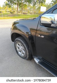 Selangor, Malaysia - May 20, 2021: Side View Isuzu Dmax Punctured Tire