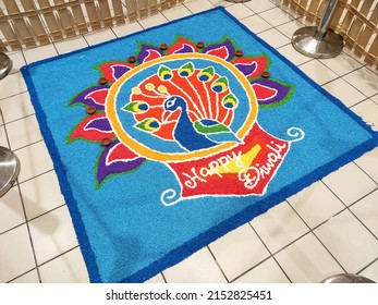 SELANGOR, MALAYSIA -OCTOBER 29, 2021: Attractive Deepavali Kolam Design. Built Using Colored Rice By Experts And Its Design Is Based On Elements In Indian Society. Colorful And Beautiful. 