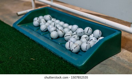 Selangor, Malaysia - September 17, 2019: The Close Up View Of The Golf Balls In The Basket At The Puncak Alam Golf Driving Range During The Night.